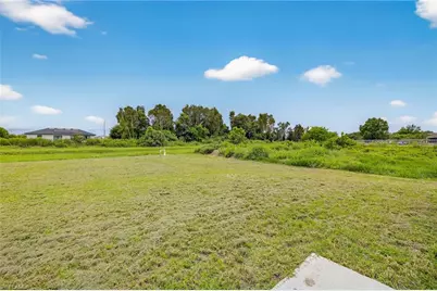 569 Aspen Ave S, Lehigh Acres, FL 33974 - Photo 19