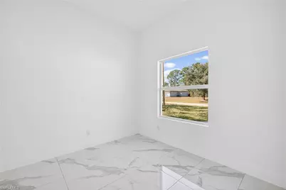 2603 50th St W, Lehigh Acres, FL 33971 - Photo 35