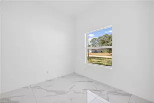2603 50th St W, Lehigh Acres, FL 33971 - Photo 35