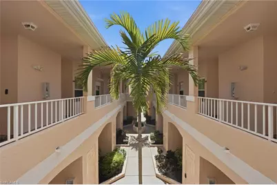 1096 Woodshire Ln #C202, Naples, FL 34105 - Photo 1