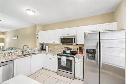 9185 Celeste Dr #1-103, Naples, FL 34113 - Photo 1