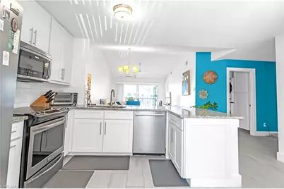 1330 Derbyshire Ct #E203, Naples, FL 34116 - Photo 11