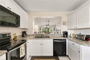 685 Squire Cir, Naples, FL 34104 - Photo 11