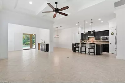9436 Whooping Crane Way, Naples, FL 34120 - Photo 11