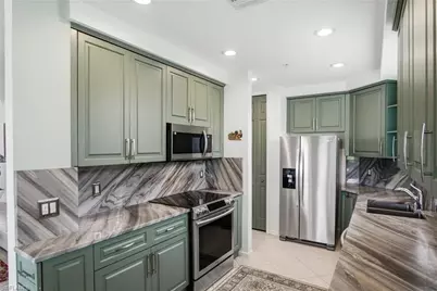 3960 Deer Crossing Ct #6-101, Naples, FL 34114 - Photo 11