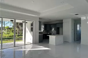 718 Chattman St E, Lehigh Acres, FL 33974 - Photo 3
