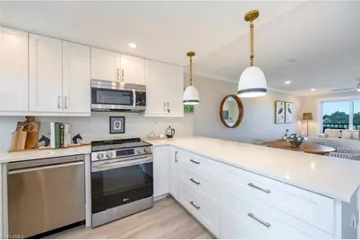 29 High Point Cir E #403, Naples, FL 34103 - Photo 1
