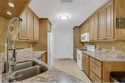 3425 29th Ave SW, Naples, FL 34117 - Photo 11