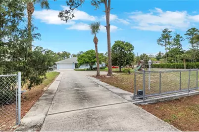 521 31st St SW, Naples, FL 34117 - Photo 1