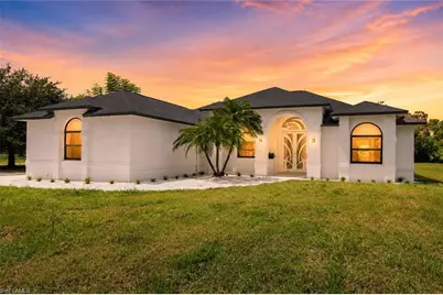 221 10th St SE, Naples, FL 34117 - Photo 1