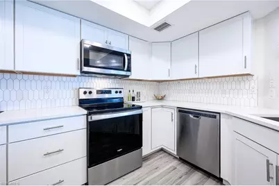 586 Beachwalk Cir #O-205, Naples, FL 34108 - Photo 7