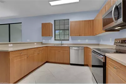 15454 Summit Place Cir #125, Naples, FL 34119 - Photo 9