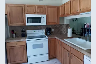 3001 Sandpiper Bay Cir #B106, Naples, FL 34112 - Photo 3