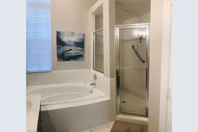 25240 Pelican Creek Cir #202, Bonita Springs, FL 34134 - Photo 19