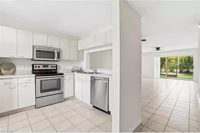 7774 Jewel Ln #102, Naples, FL 34109 - Photo 7