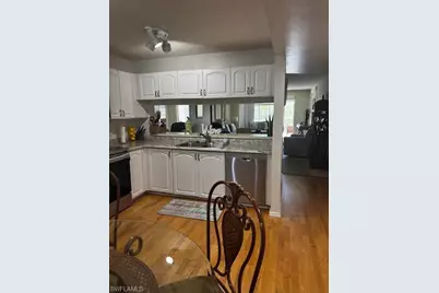 3061 Sandpiper Bay Cir #J104, Naples, FL 34112 - Photo 5
