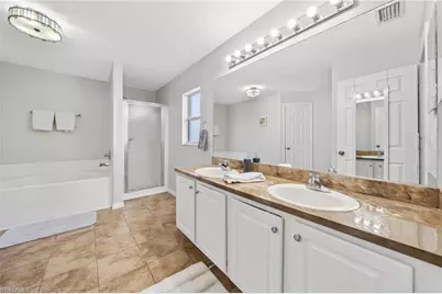 2409 E Edgewater Way, Lehigh Acres, FL 33936 - Photo 25