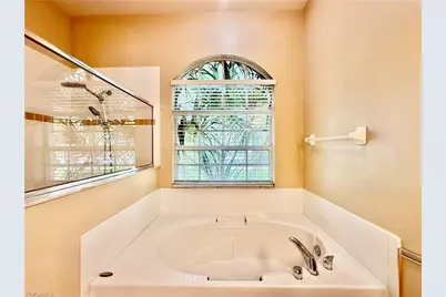 14511 Jekyll Island Ct, Naples, FL 34119 - Photo 9