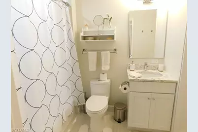 7655 Pebble Creek Cir #302, Naples, FL 34108 - Photo 13