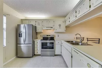 1702 Kings Lake Blvd #102, Naples, FL 34112 - Photo 7