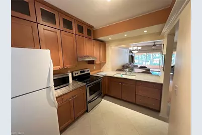 1018 Woodshire Ln #A209, Naples, FL 34105 - Photo 1
