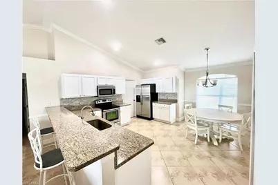2720 NE 1st Pl, Cape Coral, FL 33909 - Photo 7