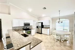 2720 NE 1st Pl, Cape Coral, FL 33909 - Photo 7