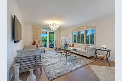 7425 Pelican Bay Blvd #206, Naples, FL 34108 - Photo 1