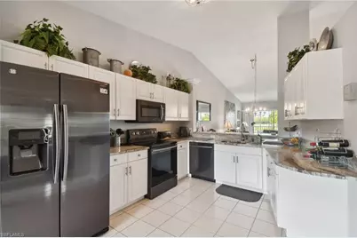 9165 Michael Cir #1002, Naples, FL 34113 - Photo 3