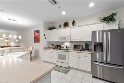 4853 Hampshire Ct #105, Naples, FL 34112 - Photo 7