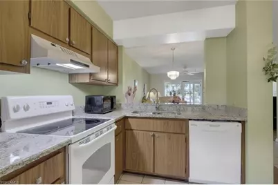 1025 Foxfire Ln #110, Naples, FL 34104 - Photo 5