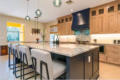 7703 Martino Cir, Naples, FL 34112 - Photo 7