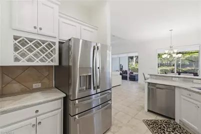 9235 Troon Lakes Dr, Naples, FL 34109 - Photo 11