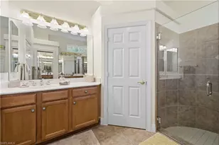 9235 Troon Lakes Dr, Naples, FL 34109 - Photo 21