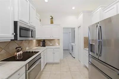 9235 Troon Lakes Dr, Naples, FL 34109 - Photo 13