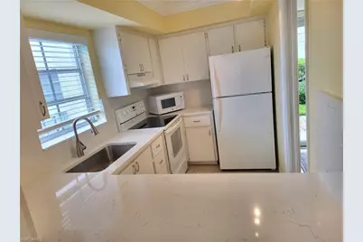 5 High Point Cir W #104, Naples, FL 34103 - Photo 3