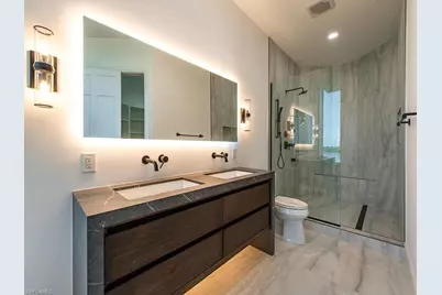 60 Seagate Dr #305, Naples, FL 34103 - Photo 13