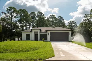 135 McArthur Blvd, Lehigh Acres, FL 33974 - Photo 1