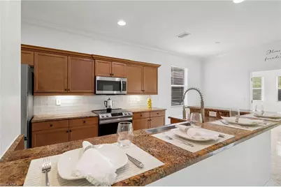 13599 Troia Dr, Estero, FL 33928 - Photo 11