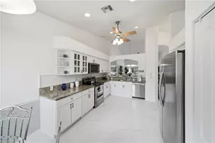 8018 Tauren Ct, Naples, FL 34119 - Photo 7