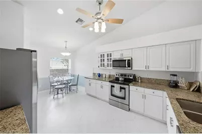 8018 Tauren Ct, Naples, FL 34119 - Photo 9