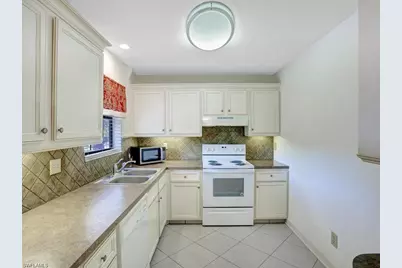 5501 Rattlesnake Hamm Rd #209, Naples, FL 34113 - Photo 17