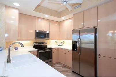 430 Cove Tower Dr #302, Naples, FL 34110 - Photo 7