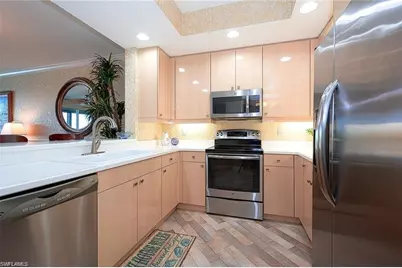 430 Cove Tower Dr #302, Naples, FL 34110 - Photo 25