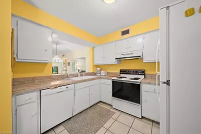 1001 Foxfire Ln #102, Naples, FL 34104 - Photo 9