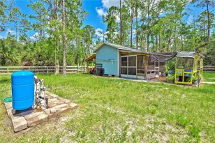 1867 Long Beach Dr, Lehigh Acres, FL 33972 - Photo 33