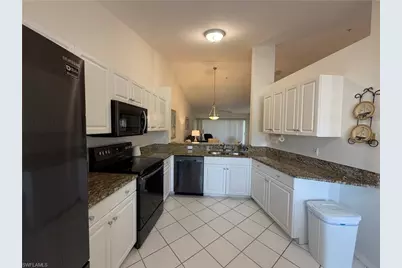9009 Michael Cir #1-110, Naples, FL 34113 - Photo 3