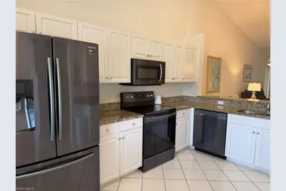 9009 Michael Cir #1-110, Naples, FL 34113 - Photo 5