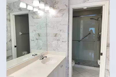 9009 Michael Cir #1-110, Naples, FL 34113 - Photo 19