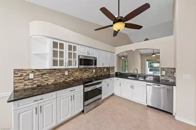 8471 Ibis Cove Cir #M677, Naples, FL 34119 - Photo 7
